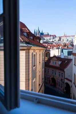 a view of a city from a window at Duplex 165m2 with VIEWS only 30 Seconds to Charles Bridge in Prague