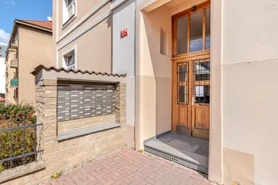 a door to a building with a garage at Charm Apartment Deco near Old Town, All-Friendly in Prague