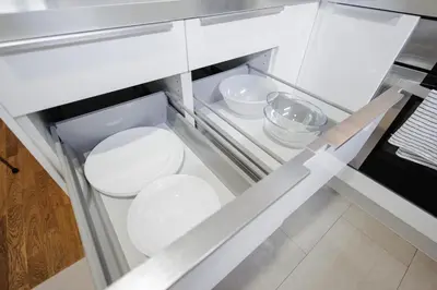 an open refrigerator with two white bowls in it at Charming Duplex Loft in Prague Center in Prague