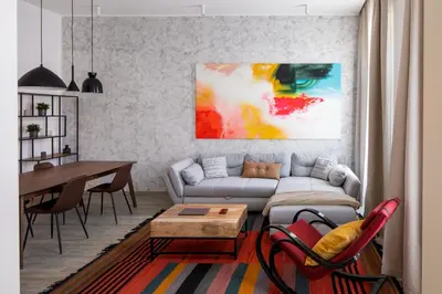 a living room with a couch and a table at Spectrum Apartment in Prague