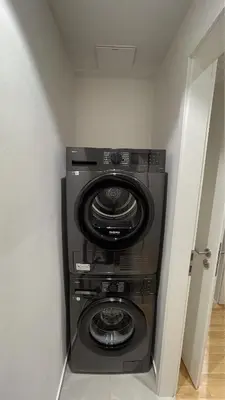 a computer system stacked on top of a wall at Viktoria Suite N3 with Garage & Balcony in Prague