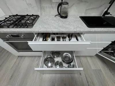 a kitchen with a stove and a counter at Modern, comfortable apartments near the metro in Prague