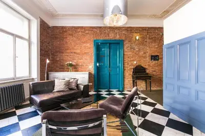 a living room with a couch and a table at 2 Bed Flat - Sleeps 3 - Wifi in Prague