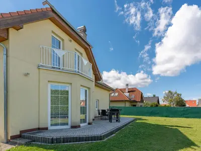 a house with a patio in the yard at Villa Garden & Terrace Villa by Interhome in Prague
