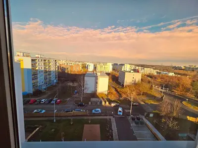 a view of a city with buildings and a parking lot at TERRACE-VIEW PRAGUE APARTMENTS for Business & Leisure, FREE PARKING & Gym, Near Metro & Aqua Sport Centre in Prague