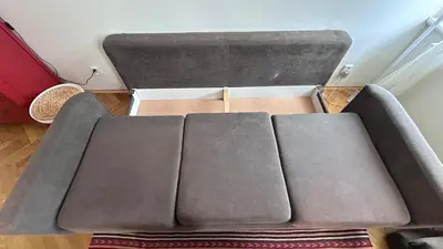 a couch sitting on the floor in a room at Stylish accommodation in the center of Prague in Prague