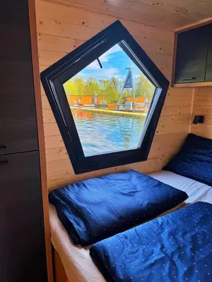 a view of a window in a small boat at House Boat s výhledem na Wake Port in Brandýs nad Labem-Stará Boleslav