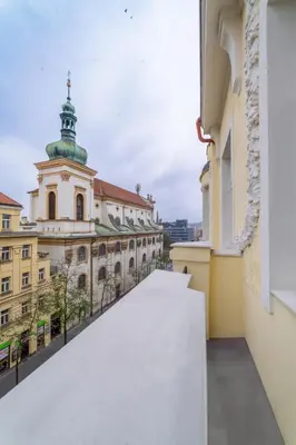 a view from the balcony of a building at Chic Brick Suites in Historic Prague City Center by Rentez in Prague