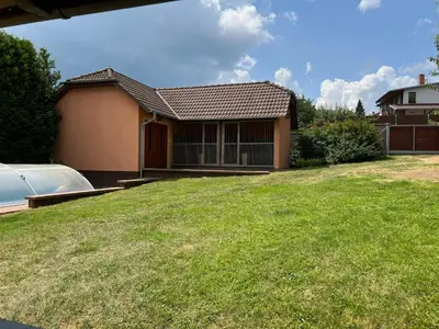 a house with a lawn in front of it at Ubytování v Nalžovicích in Nalžovice