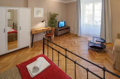 a living room with a stairway leading to a living room at 3 Bed Flat - Sleeps 12 - Wifi in Prague