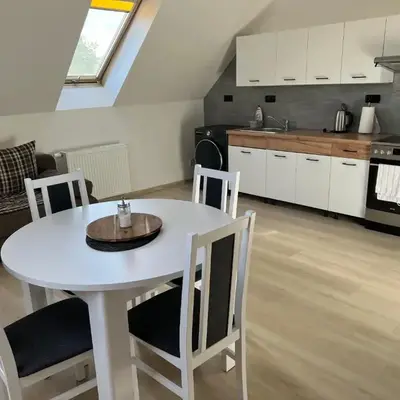 Podkrovní apartmán se společným bazénem