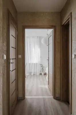 an open door into a room with a bathroom at Spacious 4-Story Home with Sauna & Garden in Prague