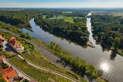 an aerial view of a river with a house at Pretty private Apartment U LABE, self-service check-in 24 l 7 in Neratovice