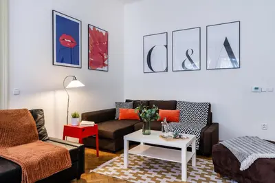 a living room with couches and a coffee table at Prague Days - Old Town Apartments in TOP location in Prague