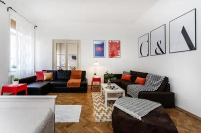 a living room with a couch and a table at Prague Days - Old Town Apartments in TOP location in Prague