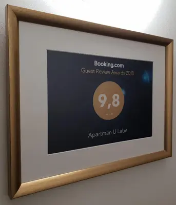 a framed picture of the guest television awards at Apartmán U Labe in Nymburk