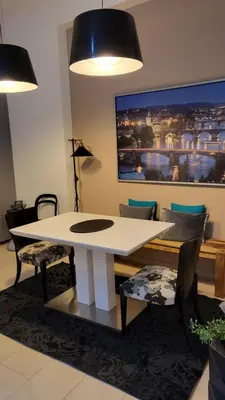 a white table and chairs in a room at Premium Apt - Center of Prague in Prague