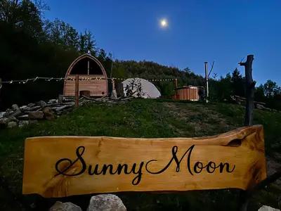 a sign that reads summer moon in a field at Glamp SunnyMoon in Sudoměř