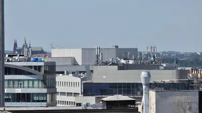 a view of a city with a factory at 1BDR Dazzling Apartment only 8 min to Wenceslas Square in Prague