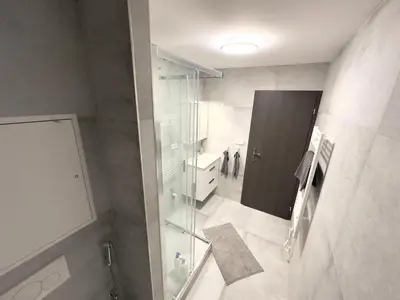 a bathroom with a glass shower and a sink at 1BDR Dazzling Apartment only 8 min to Wenceslas Square in Prague