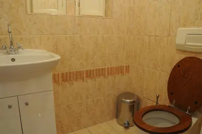 a bathroom with a toilet and a sink at Large Apartment sleeps up to 10 M4A in Prague