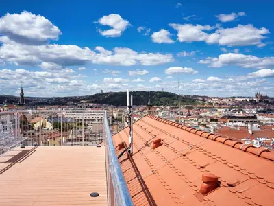 a view of a city from the roof of a building at EA Hotel Moment Self Check-In in Prague