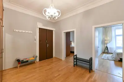 a living room with a couch and a coffee table at Vinohrady Retreat 2BDR Central in Prague