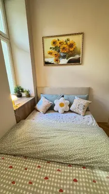 a bedroom with a bed with two stuffed animals on it at Newly renovated apartment in Wenceslas square in Prague