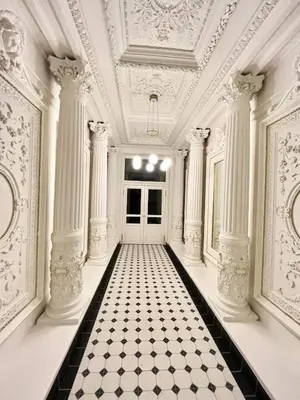 a white room with a black and white checkered floor at Newly renovated apartment in Wenceslas square in Prague