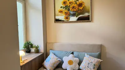 two teddy bears sitting on the back of a couch with pillows at Newly renovated apartment in Wenceslas square in Prague