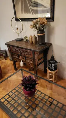 a room with a table with a potted plant on it at Premium Apt - Free Massages from Physiotherapists in Prague