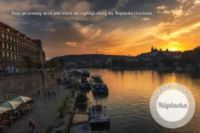 a view of a river with boats in the water at Premium Apt - Free Massages from Physiotherapists in Prague