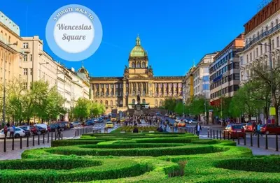 a city with a large building with a clock tower at Premium Apt - Free Massages from Physiotherapists in Prague