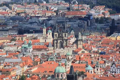 an aerial view of a city with red roofs at Large apartment Prosek - Your second home! in Prague