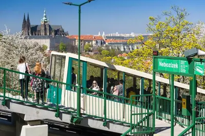 people getting on a tram in the city of munich at Prague Romantic Apartment near Charles Bridge in Prague