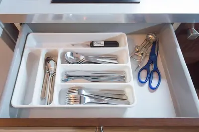 a drawer filled with utensils in a refrigerator at Navratilova Apartment in Prague