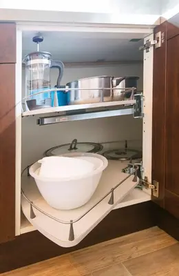 a kitchen with a sink and some pots and pans at Navratilova Apartment in Prague