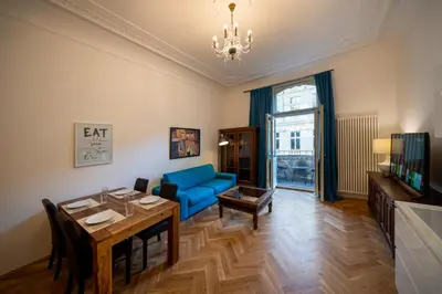a bedroom with a bed and a large window at OLD TOWN - 3 Room 2 Bathroom Balcony in Prague