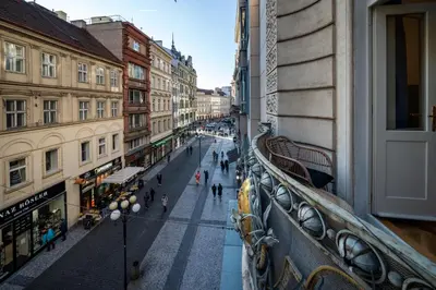 a view of a city street from a balcony at OLD TOWN - 3 Room 2 Bathroom Balcony in Prague