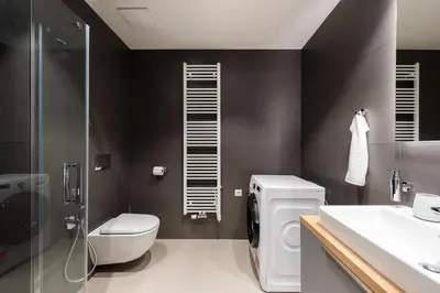 a bathroom with a toilet and a sink and a shower at Fresh All-in Apartment Prague in Prague