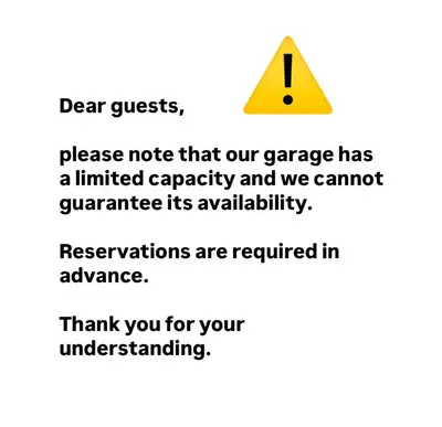 a screenshot of a phone with a warning sign at Accommodation Smečky 14 in Prague