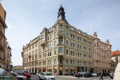 a large building with a tower on top of it at OLD TOWN - 4 Room 2 Bathroom Apartment in Prague