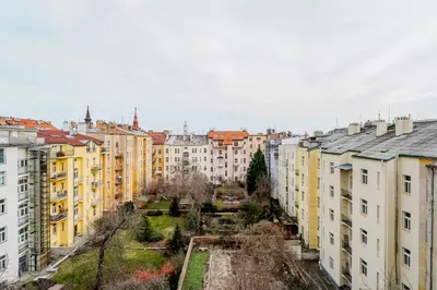 an aerial view of a city with buildings at Blueground Prague 2 furnished Náměstí Míru PRG-44 in Prague