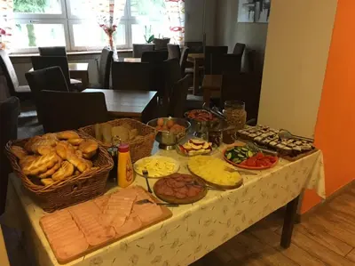 a table with many different types of food on it at Lávka 222 in Chocerady