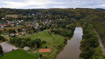 an aerial view of a river with a town at Domeček Pikovice in Píkovice