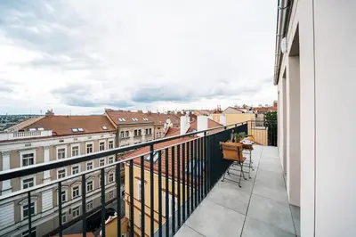 a balcony with a view of buildings at WagnerStays Modern Suites Residence in Prague