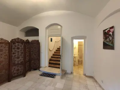 a hallway with a staircase in a house at CozyGem House 2