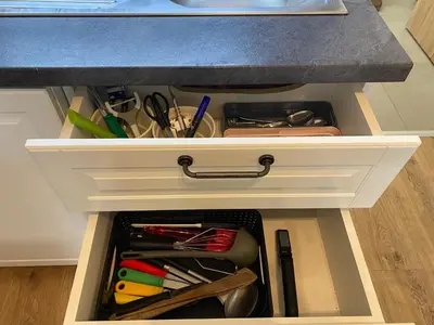 a drawer under a counter with a drawer at NEW apartment in Prague in Prague