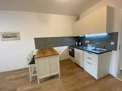 a kitchen with a sink and a counter top at NEW apartment in Prague in Prague