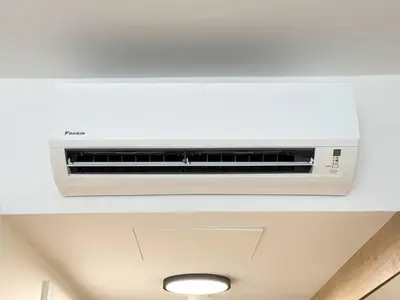 a ceiling air conditioner in a room at REAL Living by REFA Karlin 406 in Prague